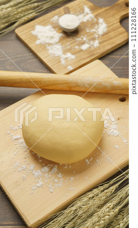 Dough making image | Dough, flour, and ears of wheat Dough making image | Dough, flour, and ears of wheat 111228166