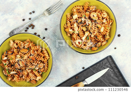 Pasta with mussels and shrimp. 111230546