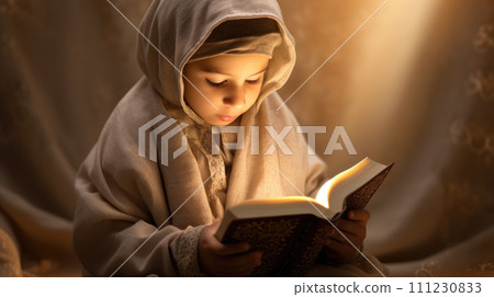reads Quran, displaying deep spiritual connection. reads Quran, displaying deep spiritual connection. 111230833