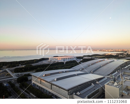 Sky and sea stained in a morning glow 111231068