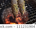 Prawns grilled on a charcoal grill 111231904
