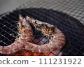 Prawns grilled on a charcoal grill 111231922