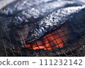 Sardines grilled on a charcoal grill 111232142