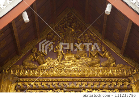 wall detailed of Wat Mai in Luang Prabang ,Laos wall detailed of Wat Mai in Luang Prabang ,Laos 111235786