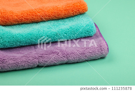 Several household microfiber clothes and mops Several household microfiber clothes and mops 111235878