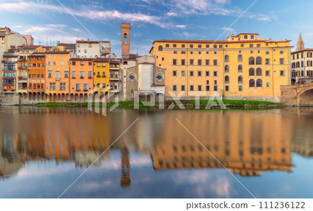 Old stone houses on the banks of the Arno river Florence early in the morning. 111236122