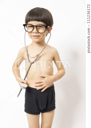 Cute Asian kid playing doctor with stethoscope isolated on white. Cute Asian kid playing doctor with stethoscope isolated on white. 111236172