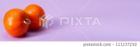 Intimate piercing. Minimal piercing concept. Tangerines with piercings 111237250