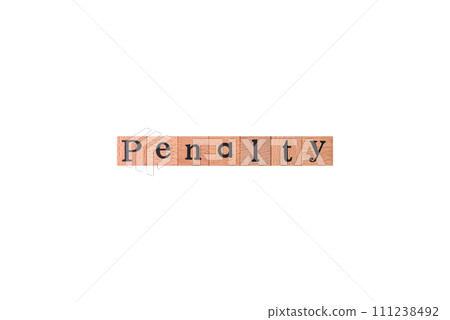The inscription Penalty made up of wooden cubes on a plain background 111238492