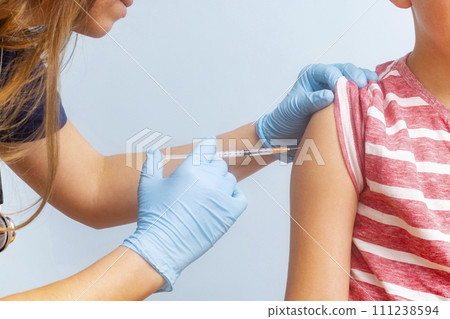 Pediatric Vaccination Procedure with Syringe 111238594