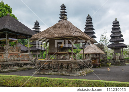 Scenery view of spiritual shrine inner temple of Pura Taman Ayun the royal temple of Mengwi empire in Badung Regency, Bali, Indonesia. View in the Cloudy day. 111239053