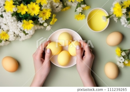 Yellow Easter eggs. Paint. View from above. AI-generated content 111239265