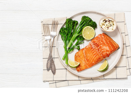 hot smoked salmon with cooked broccoli and lime hot smoked salmon with cooked broccoli and lime 111242208