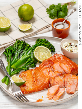hot smoked salmon with cooked broccoli and lime hot smoked salmon with cooked broccoli and lime 111242209