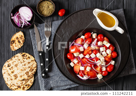 tomato salad with red onion and white cheese 111242211