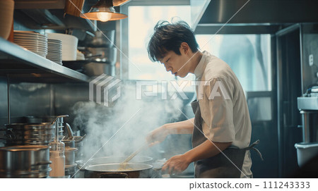 Asian male chef making ramen in the kitchen. 111243333