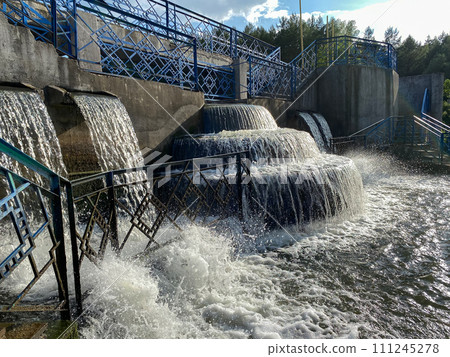 Fountain made like a cascade. Water falls beautifully and the foam occurs. Small architectural form 111245278