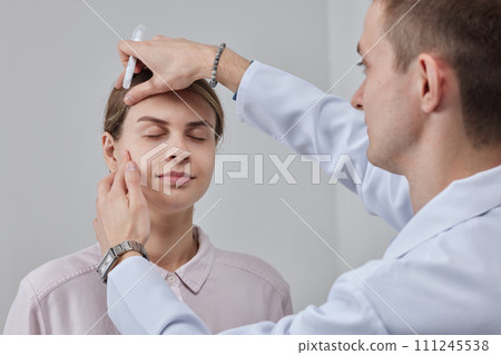 plastic surgeon prepares for Blepharoplasty, Blepharoplasty operation plastic surgeon prepares for Blepharoplasty, Blepharoplasty operation 111245538