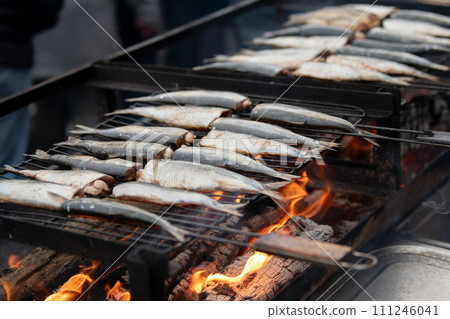Herring on a grill on the market 111246041