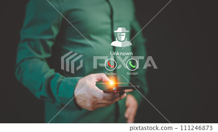 Man answering the incoming call. The phone call was from an unknown number. Call center gang or stranger. Hoax person with a fake identity. Concept of scam, fraud with a smartphone from the criminal. 111246873