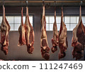 AI-generated content. Meat industry, meats hanging in cold store. Cattles cut, hanged on hook in a slaughterhouse AI-generated content. Meat industry, meats hanging in cold store. Cattles cut, hanged on hook in a slaughterhouse 111247469