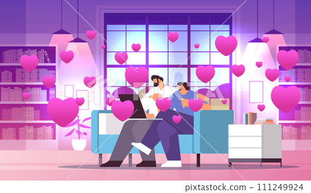 couple in love using laptop man woman lovers relaxing on sofa social media network valentines day celebration concept 111249924