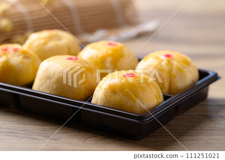 Chinese pastry mooncake, Traditional dessert celebrating in Chinese festival mid autumn or new year Chinese pastry mooncake, Traditional dessert celebrating in Chinese festival mid autumn or new year 111251021