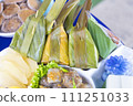 Steamed coconut custard with sweet coconut filling or stuffed snack 111251033