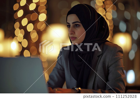 Arab woman works at a laptop in a cafe, Generative AI Arab woman works at a laptop in a cafe, Generative AI 111252028