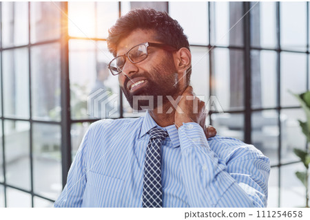He has shoulder neck and back pain Working hard and overtime too much going to symptom office syndrome He has shoulder neck and back pain Working hard and overtime too much going to symptom office syndrome 111254658