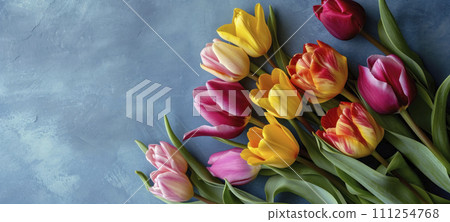 AI-generated content. Colorful Tulips Against Blue Textured Background 111254768