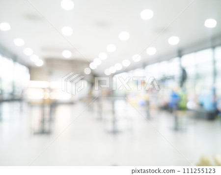 Blurred background hospital healthcare white bokeh with copy space. Blue clean bright blurry background medical laboratory backdrop. Interior lobby simple living space light bokeh. Blurry hallway 111255123