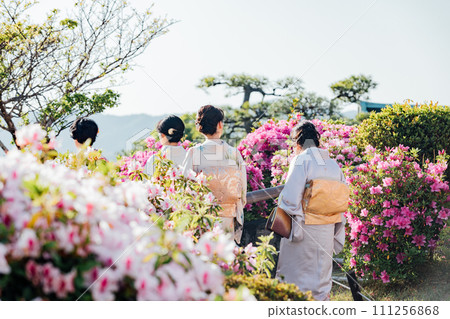 A woman wearing a kimono enjoying the Azalea Festival at Gamagori Classic Hotel 111256868