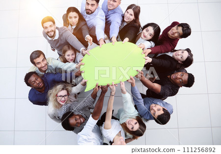 businessmen holding blank speech bubble above their heads 111256892