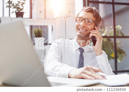 Man accountant or business lawyer talking on smartphone 111256930