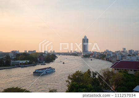 Aerial view of Bangkok Downtown Skyline with Chao Phraya River, Thailand. Financial district and business centers in smart urban city in Asia. Skyscraper and high-rise buildings. 111257034