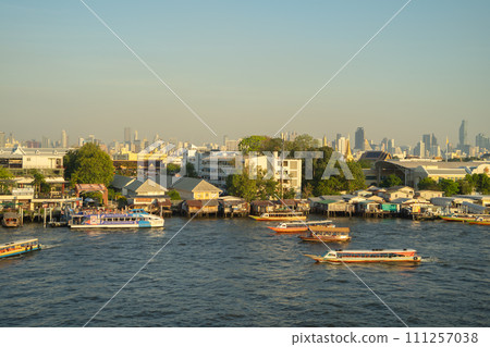 Aerial view of Bangkok Downtown Skyline with Chao Phraya River, Thailand. Financial district and business centers in smart urban city in Asia. Skyscraper and high-rise buildings. 111257038