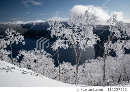 Lake Mashu has beautiful hoarfrost Lake Mashu has beautiful hoarfrost 111257312