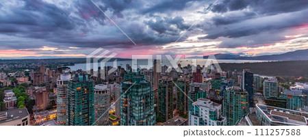 Downtown Vancouver City at cloudy sunset. Aerial Panorama Downtown Vancouver City at cloudy sunset. Aerial Panorama 111257588