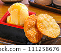 Japanese-style sweets: Sake lees ice cream and rice crackers 111258676
