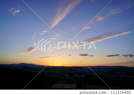 Autumn sunset/flowing clouds 111259400