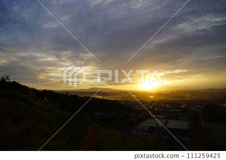Autumn sunset at Kizugawa City Castle Park 111259425