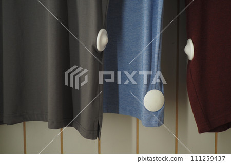 Clothing security tag on a shirt , Clothing security tag on a shirt , 111259437
