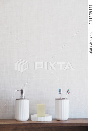 bathroom soap dispenser and toothbrush cup 111259551