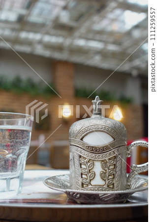 a cup of turkish coffee on table a cup of turkish coffee on table 111259557