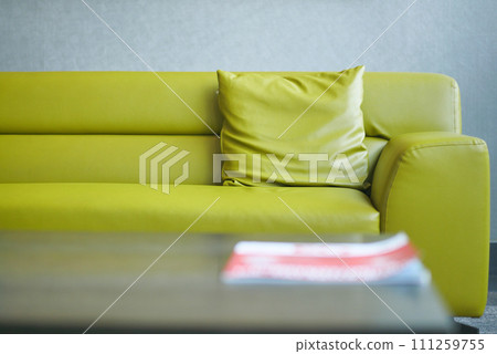 modern yellow sofa with pillows in living room at home modern yellow sofa with pillows in living room at home 111259755