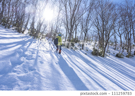 Walking in the snow with snowshoes, Kagami Oyama 111259783