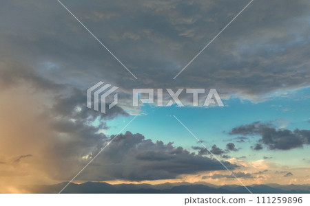 Beautiful blue sky and cumulus clouds abstract background. Cloudscape background. Blue sky and fluffy clouds. World Ozone Day. Ozone layer. Overcast clouds. Peaceful and tranquil. Dramatic sky. 111259896