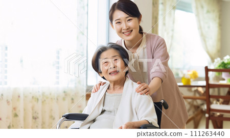 Seniors and nursing care, Japanese women in wheelchairs and caregivers Seniors and nursing care, Japanese women in wheelchairs and caregivers 111263440