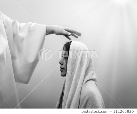 Blessing hand above the head of a woman in a headscarf Blessing hand above the head of a woman in a headscarf 111263920